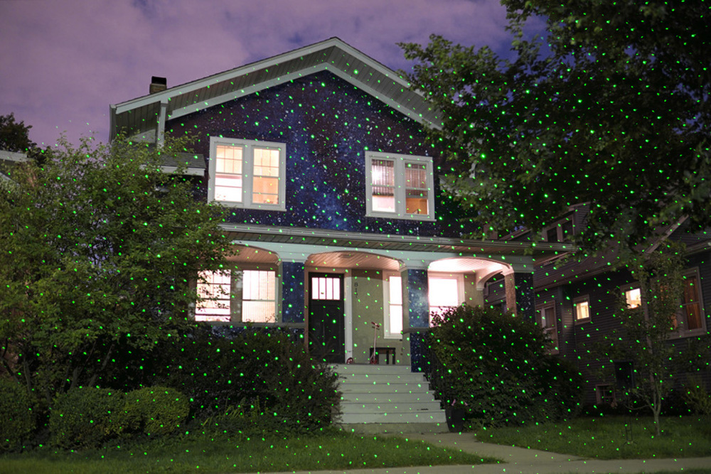 LED dekorativer Laserprojektor farbige Hausfassade grün rot